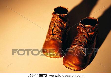 Stock Image - Baby shoes. Fotosearch