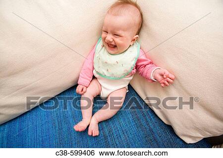 Baby Sitting on Sofa View Large Photo Image Stock Photograph - Baby Sitting on Sofa. Fotosearch