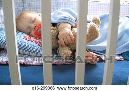 baby sleeping with teddy bear View Large Photo Image Stock Photograph - baby sleeping with teddy bear. Fotosearch
