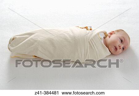 Baby swaddled View Large Photo Image Stock Image - Baby swaddled. Fotosearch