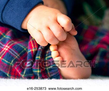 baby touching foot View Large Photo Image Stock Image - baby touching foot. Fotosearch