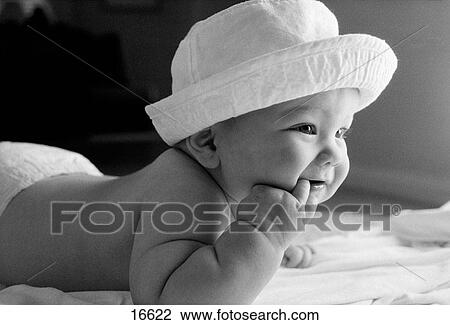 Baby with hat View Large Photo Image Stock Image - Baby with hat. Fotosearch
