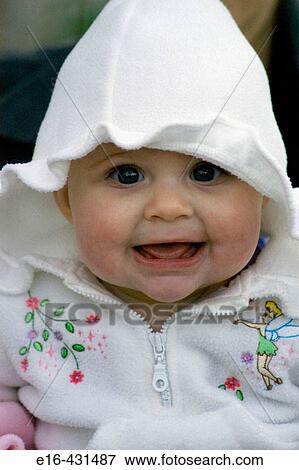 Baby with hooded jacket View Large Photo Image Stock Photo - Baby with hooded jacket. Fotosearch