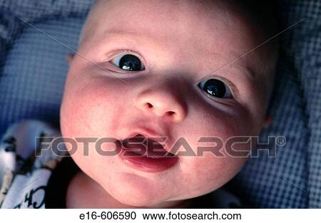 Baby with pleasant smile View Large Photo Image Stock Image - Baby with pleasant smile. Fotosearch