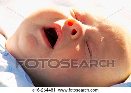 Stock Image - baby yawn. Fotosearch