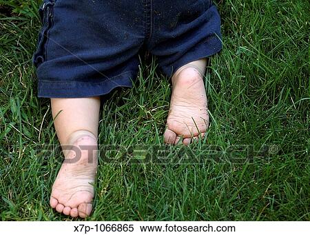 Baby's feet crawling away View Large Photo Image Stock Photography - Baby's feet crawling away. Fotosearch