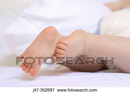 Baby's feet View Large Photo Image Stock Photo - Baby's feet. Fotosearch
