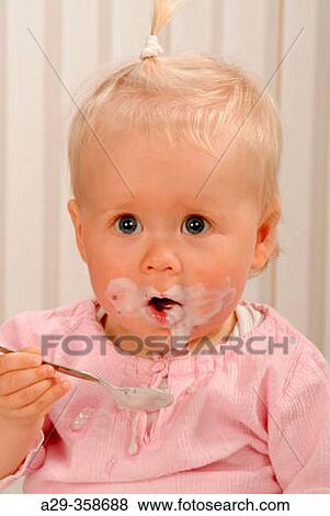 Stock Photo - Baby's first meals.. Fotosearch