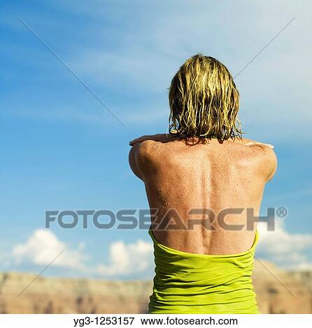 Back of adult woman with arms crossed after swimming View Large Photo Image Stock Photo - Back of adult woman with arms crossed after swimming. Fotosearch