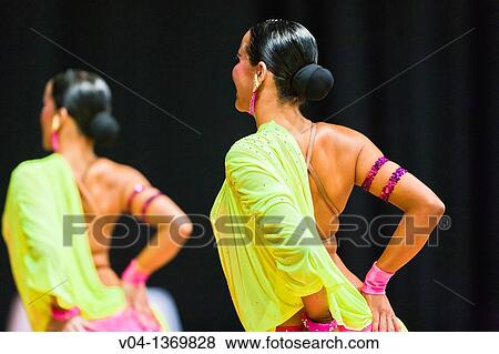 Stock Photo - Back of female dancers at a dancing competition, Germany, Europe. Fotosearch