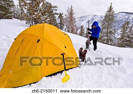 Backcountry skier and yellow dome tent, Ansel Adams Wilderness, Sierra Nevada Mountains, California USA. View Large Photo Image Stock Image - Backcountry skier and yellow dome tent, Ansel Adams Wilderness, Sierra Nevada Mountains, California USA.. Fotosearch