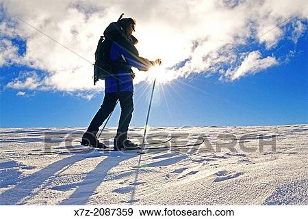 Backcountry skiing at sunset high on Deadline Ridge in the Goose Creek Mountains in southern Idaho. View Large Photo Image Stock Photo - Backcountry skiing at sunset high on Deadline Ridge in the Goose Creek Mountains in southern Idaho.. Fotosearch