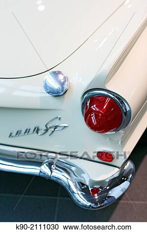 Backlight and back part of a Auto Union 1000 Sp roadster from 1965 in white, Audi Forum, Ingolstadt, Bavaria, Germany, Europe. View Large Photo Image Stock Image - Backlight and back part of a Auto Union 1000 Sp roadster from 1965 in white, Audi Forum, Ingolstadt, Bavaria, Germany, Europe.. Fotosearch