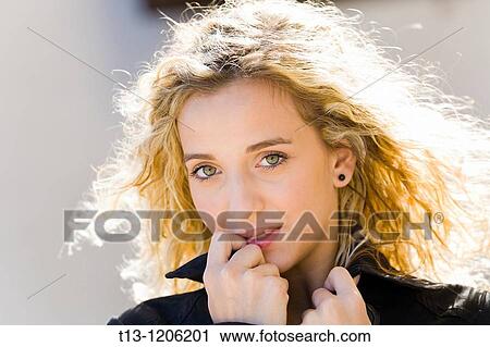 Backlit portrait of a blonde young lady View Large Photo Image Stock Image - Backlit portrait of a blonde young lady. Fotosearch