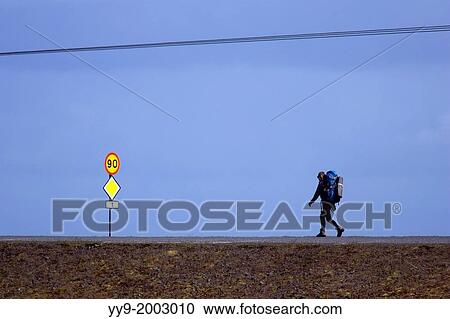 Backpacker on the Ring Road near Jokulsarlon - Southeast Iceland. View Large Photo Image Stock Image - Backpacker on the Ring Road near Jokulsarlon - Southeast Iceland.. Fotosearch