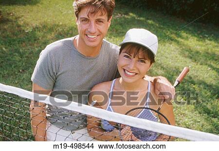 badminton players relaxing View Large Photo Image Picture - badminton players relaxing. Fotosearch