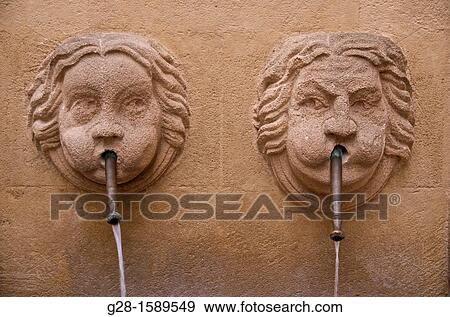 Bagniers Fountain with two faces in old town, Aix en Provence, France View Large Photo Image Stock Photo - Bagniers Fountain with two faces in old town, Aix en Provence, France. Fotosearch