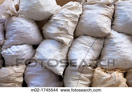 Bags of construction material View Large Photo Image Picture - Bags of construction material. Fotosearch