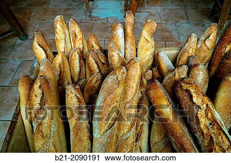 Baguette French breads in a? fournil? (bakery with a wood-fired oven), Montpon Menesterol, Dordogne, Aquitaine, France View Large Photo Image Stock Image - Baguette French breads in a? fournil? (bakery with a wood-fired oven), Montpon Menesterol, Dordogne, Aquitaine, France. Fotosearch