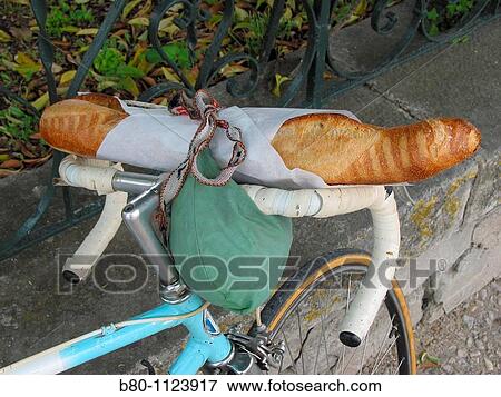 Baguette, racing bike, Pernes-les-Fontaines, France View Large Photo Image Stock Photo - Baguette, racing bike, Pernes-les-Fontaines, France. Fotosearch