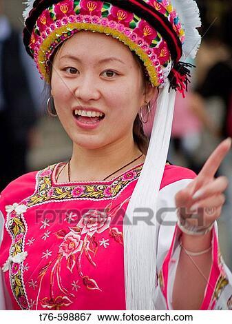 Bai girl reacts to having her photo taken, Dali, China View Large Photo Image Stock Photo - Bai girl reacts to having her photo taken, Dali, China. Fotosearch
