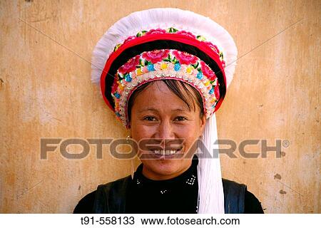 Bai women in traditional dress and bonnet. Dali, Yunnan province. China. View Large Photo Image Stock Image - Bai women in traditional dress and bonnet. Dali, Yunnan province. China.. Fotosearch