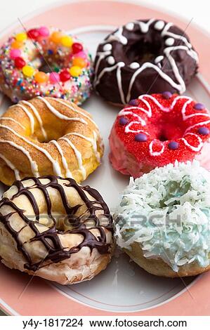 Baked Donuts With Icing View Large Photo Image Picture - Baked Donuts With Icing. Fotosearch