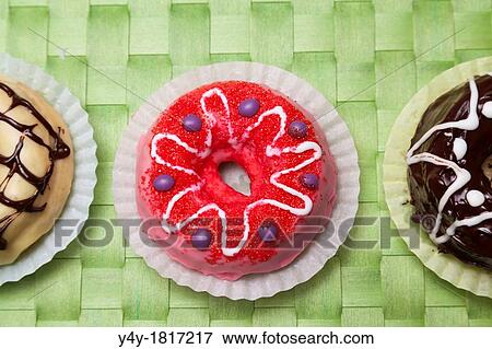 Baked Donuts With Icing View Large Photo Image Stock Photo - Baked Donuts With Icing. Fotosearch