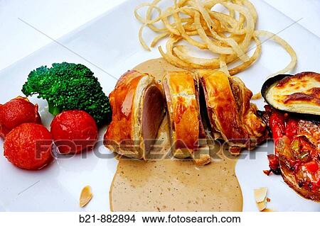 Baked pork sirloin. Malaga, Andalusia, Spain View Large Photo Image Picture - Baked pork sirloin. Malaga, Andalusia, Spain. Fotosearch