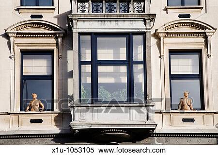 Stock Photography - Balcony Sculptures on Avenue Palmerston near Square Ambiorix Bru. Fotosearch