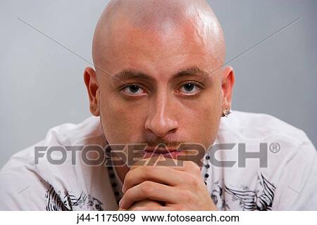 Bald man with necklace and goatee, portrait View Large Photo Image Stock Photo - Bald man with necklace and goatee, portrait. Fotosearch