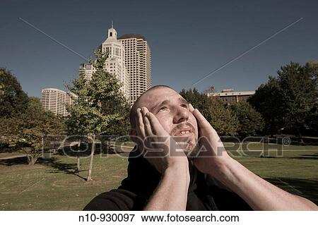 Balding man in a park View Large Photo Image Stock Photo - Balding man in a park. Fotosearch
