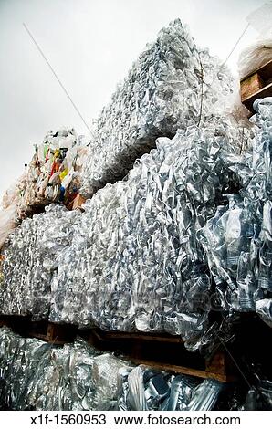 Bales of compacted waste plastic bottles awaiting collection for recycling UK View Large Photo Image Stock Image - Bales of compacted waste plastic bottles awaiting collection for recycling UK. Fotosearch