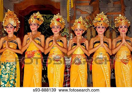 Balinese dancers in traditonal costomes lined up to take a bow at the end of a performance, Bali. View Large Photo Image Stock Photo - Balinese dancers in traditonal costomes lined up to take a bow at the end of a performance, Bali.. Fotosearch