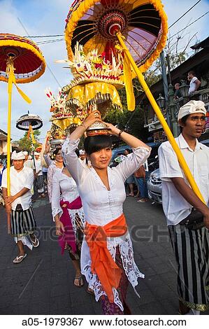 Balinese women carrying offerings to a ceremony. Religious procession, Ubud, Bali, Indonesia. South-East Asia, Asia. View Large Photo Image Stock Photo - Balinese women carrying offerings to a ceremony. Religious procession, Ubud, Bali, Indonesia. South-East Asia, Asia.. Fotosearch