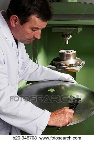 Ball test, quality control, manufacture of coulters, metallurgy View Large Photo Image Stock Photo - Ball test, quality control, manufacture of coulters, metallurgy. Fotosearch