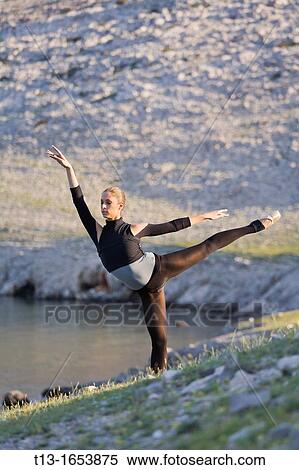 Ballerina dancing in a natural environment View Large Photo Image Stock Photography - Ballerina dancing in a natural environment. Fotosearch