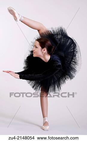 Ballerina posing in black tutu View Large Photo Image Picture - Ballerina posing in black tutu. Fotosearch