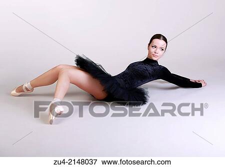 Ballerina posing in black tutu View Large Photo Image Stock Photo - Ballerina posing in black tutu. Fotosearch