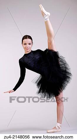 Stock Photograph - Ballerina posing in black tutu. Fotosearch