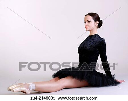 Ballerina posing in black tutu View Large Photo Image Stock Photography - Ballerina posing in black tutu. Fotosearch