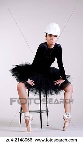 Ballerina posing in helmet View Large Photo Image Stock Photograph - Ballerina posing in helmet. Fotosearch