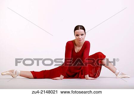 Ballerina posing in red dress View Large Photo Image Stock Image - Ballerina posing in red dress. Fotosearch