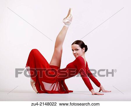 Ballerina posing in red dress View Large Photo Image Stock Image - Ballerina posing in red dress. Fotosearch