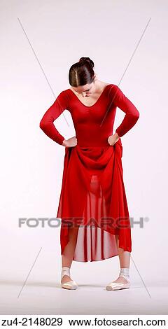 Stock Photo - Ballerina posing in red dress. Fotosearch