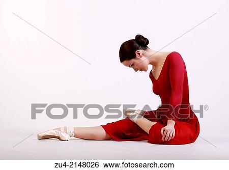Ballerina posing in red dress View Large Photo Image Stock Photograph - Ballerina posing in red dress. Fotosearch