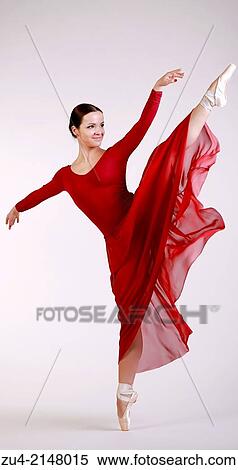 Ballerina posing in red dress View Large Photo Image Stock Photography - Ballerina posing in red dress. Fotosearch