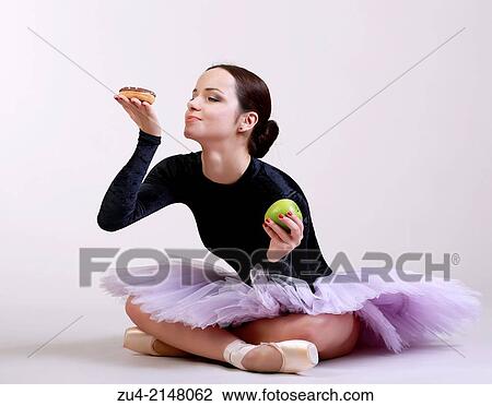 Ballerina posing with food View Large Photo Image Stock Image - Ballerina posing with food. Fotosearch