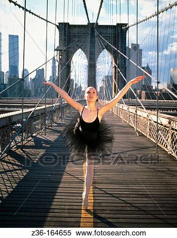 Stock Photography - Ballet dancer at Brooklyn bridge. New York City. USA. Fotosearch
