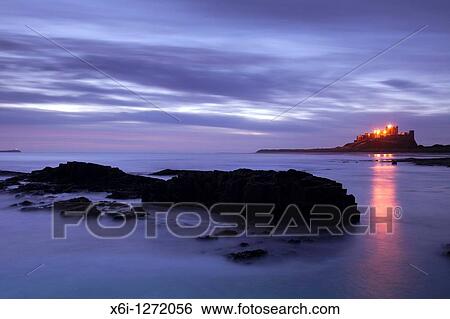 Bamburgh Castle, at dawn in autumn, Northumberland, England View Large Photo Image Stock Photograph - Bamburgh Castle, at dawn in autumn, Northumberland, England. Fotosearch